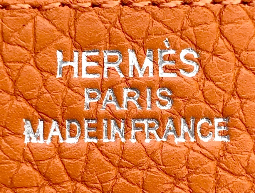 Тиснение Hermès на подделке