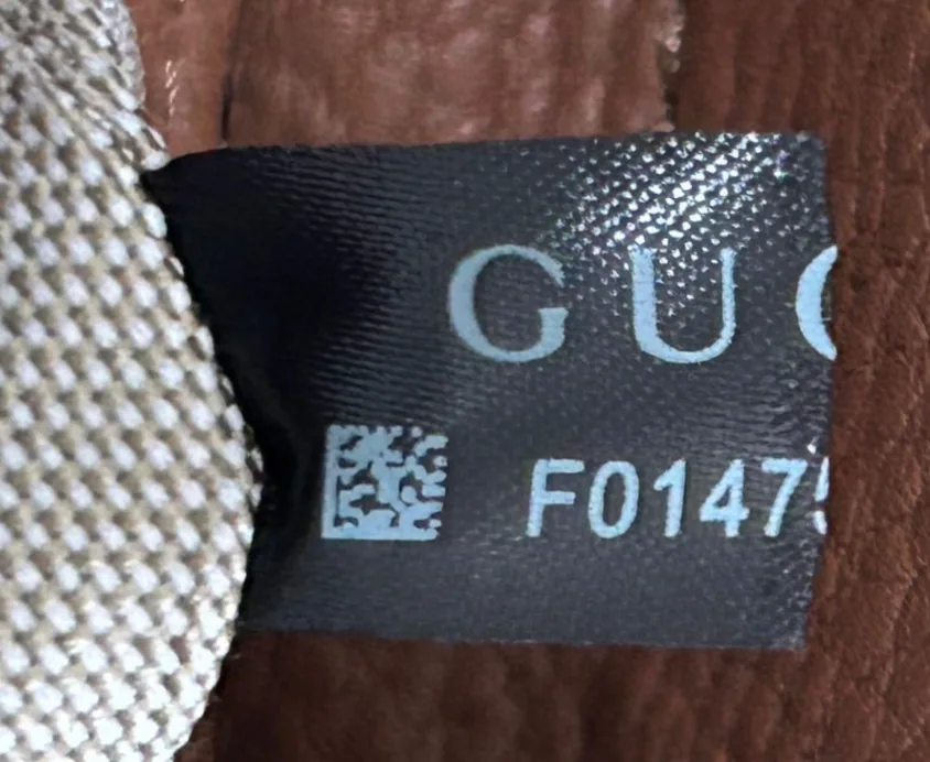 Маркировочная бирка Gucci на подделке